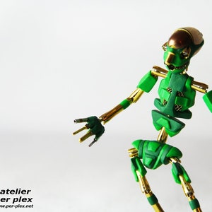Green Robot 01 gilded movable stop motion creature