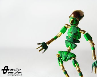 Green Robot 01 / eine vergoldete und bewegliche "stop motion" Figur aus Metall