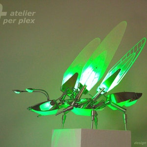 futurelevel Fire Fly Light contemporary design art lamp. Extravagant luxury light sculpture for enthusiasts of technical anatomy..  Serenity