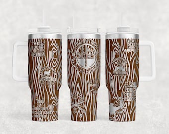 May include: A set of three stainless steel insulated tumblers with white handles and lids. The tumblers have a brown wood grain design with hunting-themed text and graphics in silver, including phrases like "The Buck Drops Here" and "Hunting is My Favorite Season."