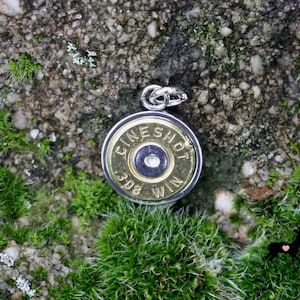 Surgical steel pendant for chain with cartridge