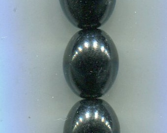 15 Bohemian oval glass beads 13 x 11 mm black
