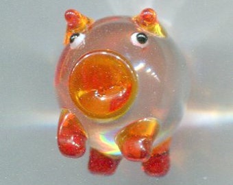 1 glass design lucky charm piggy 2.5 cm orange