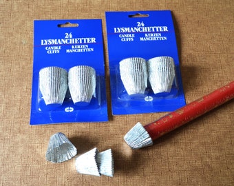 2 packages of light sleeves in aluminium, candle holders,