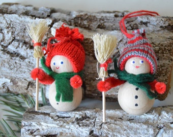 Handmade snowman made of wooden balls, Christmas figure, snowman with broom, gift tags