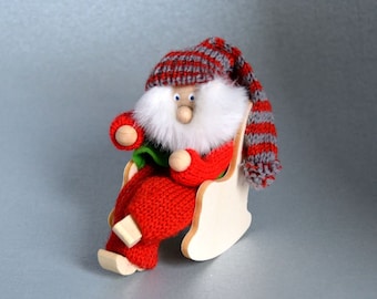 Santa Claus in a rocking chair, Julenisser from Denmark,