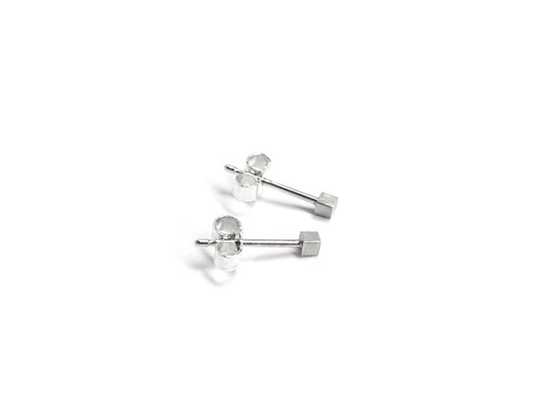 small cube-shaped studs, silver studs, square studs, square studs, square studs, small silver studs, cube studs image 5