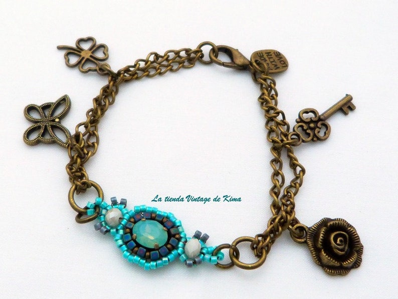 Swarovski crystal bracelet with charms image 1