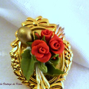 Golden brooch with red flowers image 5