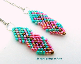 Turquoise and coral earrings feather