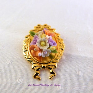 Golden brooch with red flowers image 6