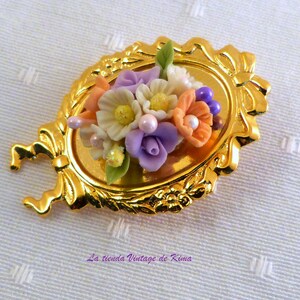 Golden brooch with red flowers image 8