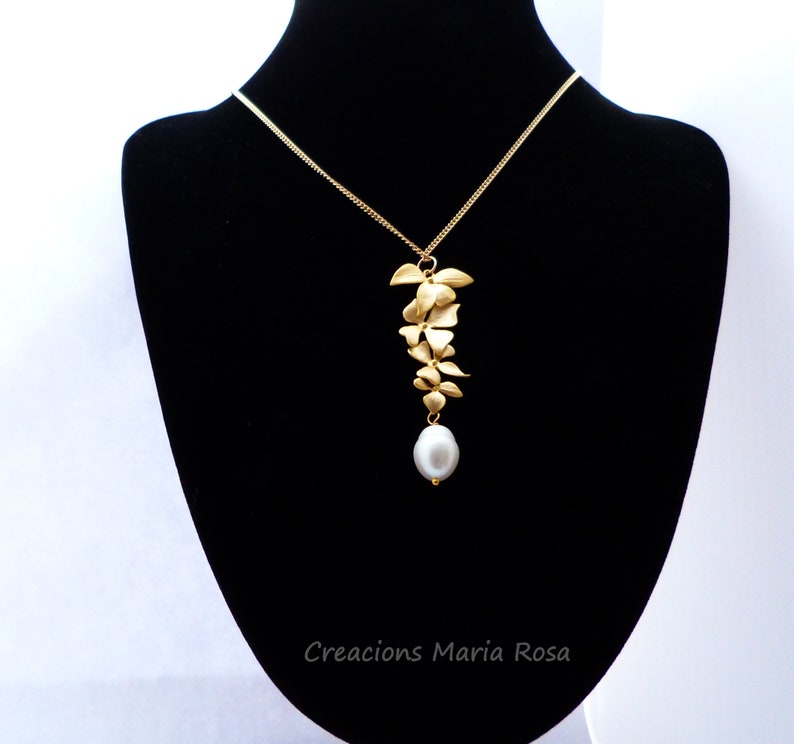 Gold pendant with natural pearl image 4