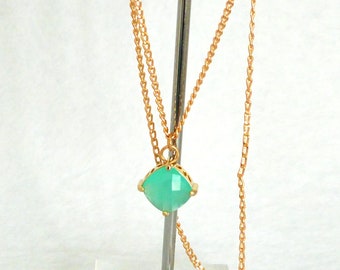 Golden crystal and mint women's pendant