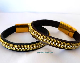 Black and brown leather bracelets and crystal