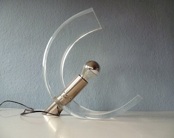 Stylish designer table lamp made of acrylic and chrome