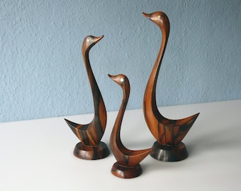 Beautifully shaped duck family made of beautifully grained wood