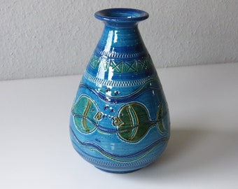 Beautiful turquoise vase with fish