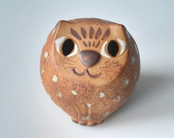 Stylized cat money box made of ceramic