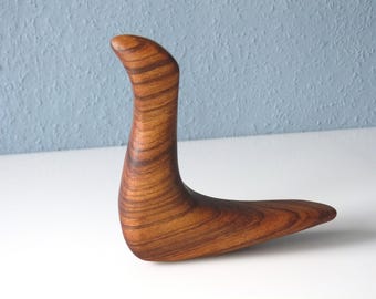 Beautifully shaped figure made of teak