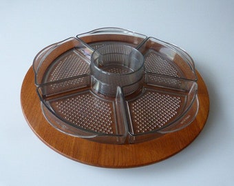 Offering bowl on teak tray