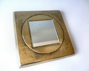 Vintage wall mirror in modern brutalist style