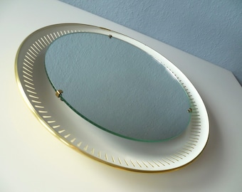 Illuminated, round mirror by Ernest Igl