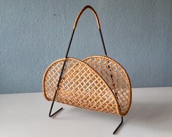Stylish newspaper rack made of metal and rattan