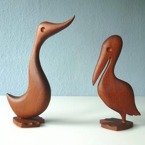 Beautifully shaped birds made of teak