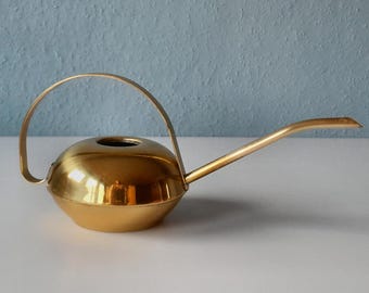 Minimalist brass cactus watering can