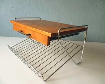 Stylish shelf made of wood and chrome