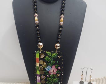 handmade Palestinian red tatreez embroidery necklace, one piece design, traditional authentic Arabic pendant necklace, Palestine flowers