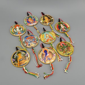 Protective amulet Car, House; Green Tara, Shakyamuni Buddha, Jambala, Chenrezig, Padmasambhava, White Tara, Medicine Buddha, Vajra Kilaya.