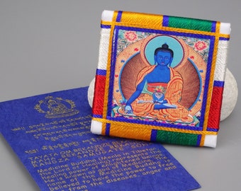 Buddhistischer Amulettschutz Sungkhors- Butti Medizinbuddha 5 x 5 cm, Blauer Buddha oder Medizinbuddha (Bhaiṣajyaguru). Hergestellt in Nepal