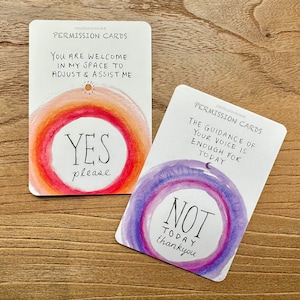 May include: Two permission cards with watercolor backgrounds. The first card has a red, orange, and yellow background with the text "You are welcome in my space to adjust & assist me" and "YES please". The second card has a purple, blue, and pink background with the text "The guidance of your voice is enough for today" and "NOT today thankyou".