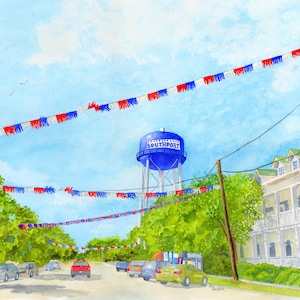 May include: Watercolor painting of a street scene in Southport, North Carolina. A blue water tower with the word "Southport" is visible. Red, white, and blue bunting hangs overhead. Cars are parked along the street, and buildings line the sides.