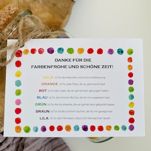 May include: A white card with colorful dots around the border. The card says "Danke f&uuml;r die Farbenfrohe und sch&ouml;ne Zeit!" and lists the colors yellow, orange, red, blue, green, brown, and purple with a short phrase describing what each color represents.