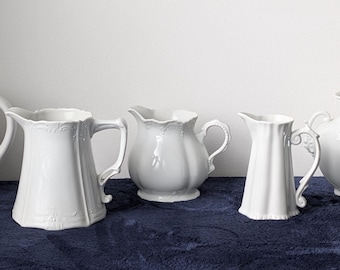 Vintage white ornate pitcher creamer set