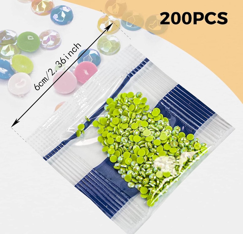 May include: A clear plastic bag filled with 200 green round rhinestones. The bag is labeled "200PCS".