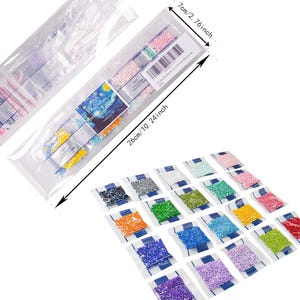 May include: A set of 20 small plastic bags filled with colorful diamond-shaped beads. The bags are arranged in a grid pattern on a white surface. The bags are labeled with numbers. The bags are 7 inches long and 10 inches wide.