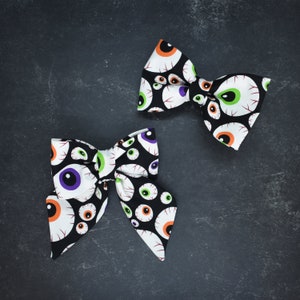 Multicolor Eyes on Black Fabric Detachable Pet Bows
