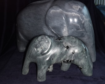 Soapstone elephants, mother and child