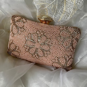 Statement Rose Gold pearl embellished clutch bag/purse