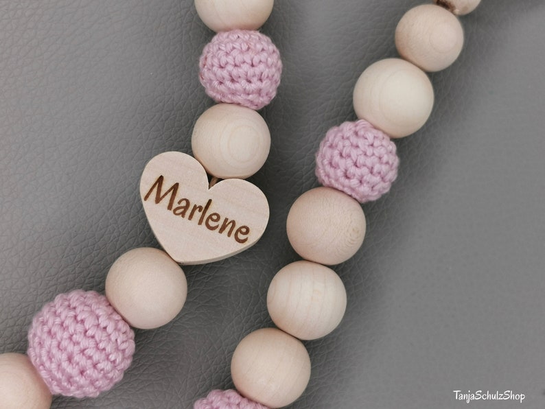 Baby Kinderwagenkette Einhorn personalisiert mit dem Namen