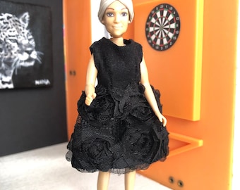 A Lundby grandmother doll with new flowers dress (1:18)