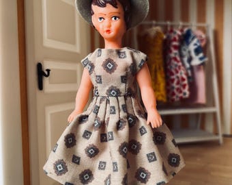A dress with hat for Ari doll (The doll is not included)