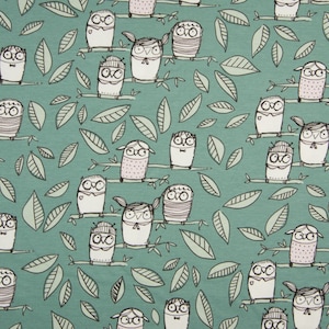 Cotton jersey owls in forest Staubieg green