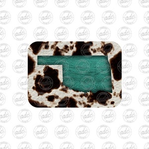 May include: A teal blue outline of the state of Oklahoma on a white and brown cowhide background.