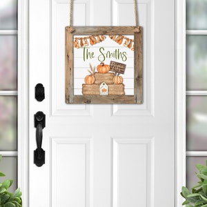May include: A wooden sign with a rustic frame and a white background. The sign features a fall-themed design with pumpkins, a banner, and the text "The Smiths Pumpkin Patch".