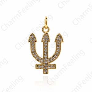 May include: A gold trident charm with clear crystals. The charm is a popular symbol of the sea and is perfect for adding a touch of nautical style to any jewelry piece.